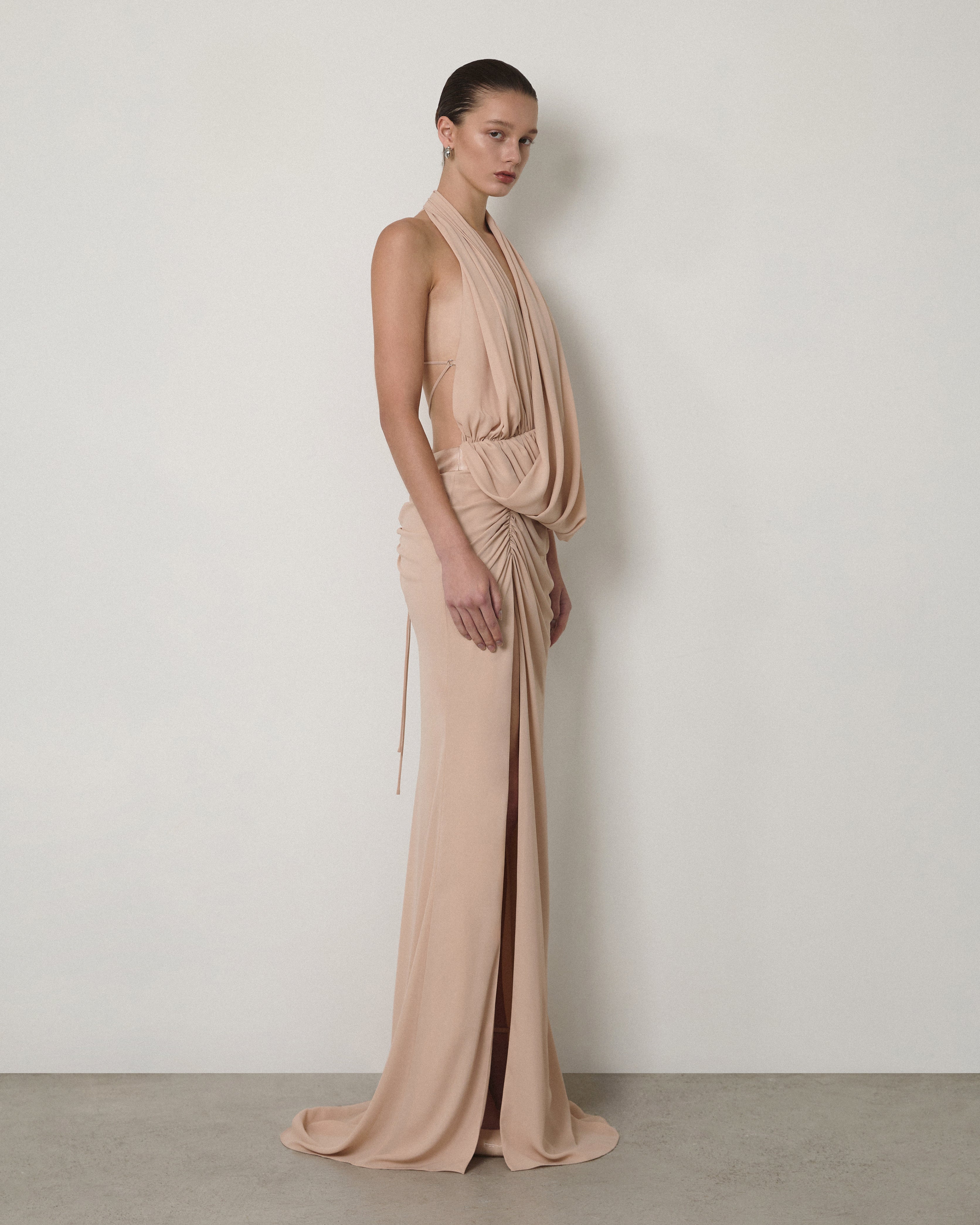 DRAPED SLEEVELESS V-NECK MAXI GOWN