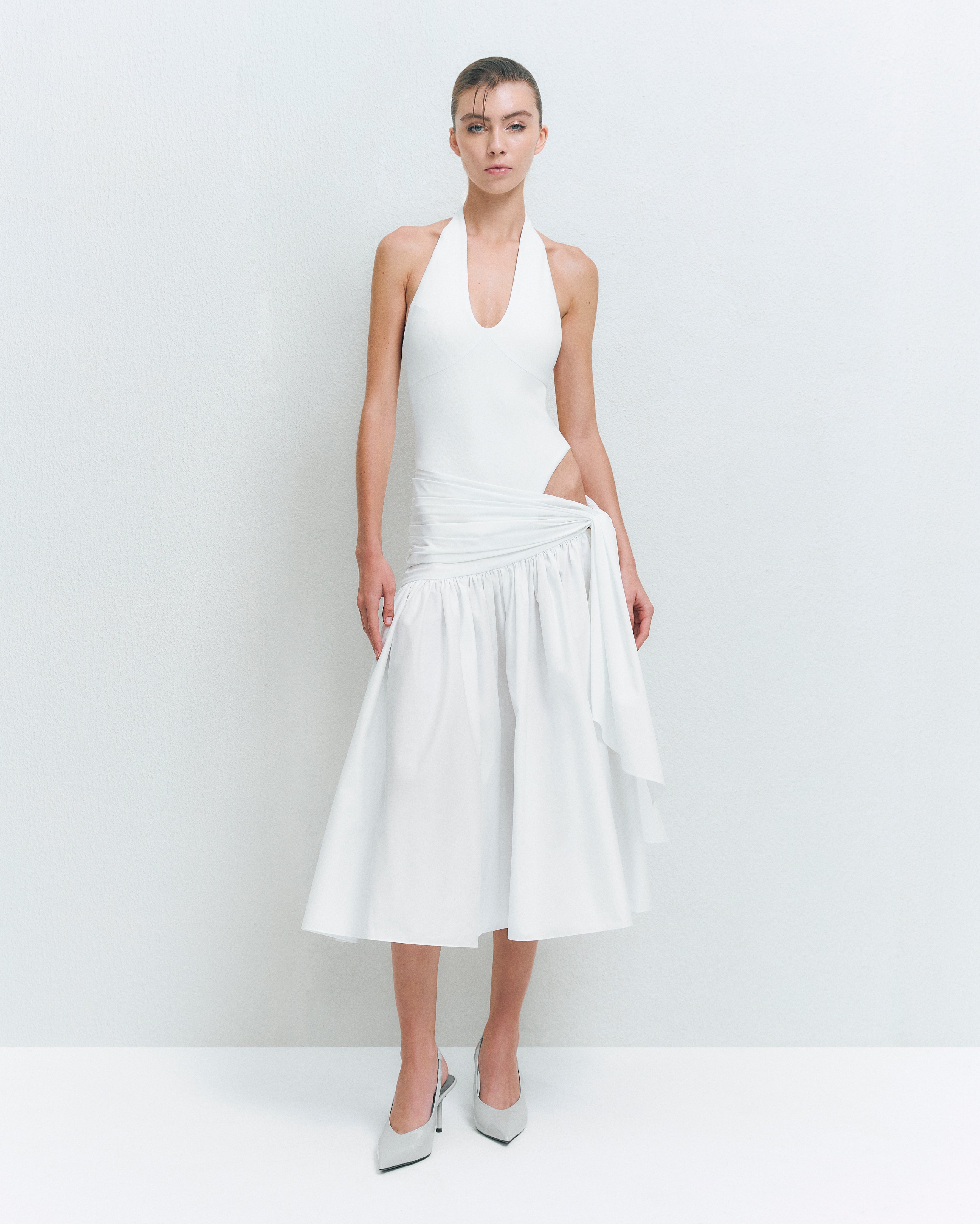 V-NECK PANELED BODYSUIT PAIRED WITH  KNOT DETAIL MIDI SKIRT