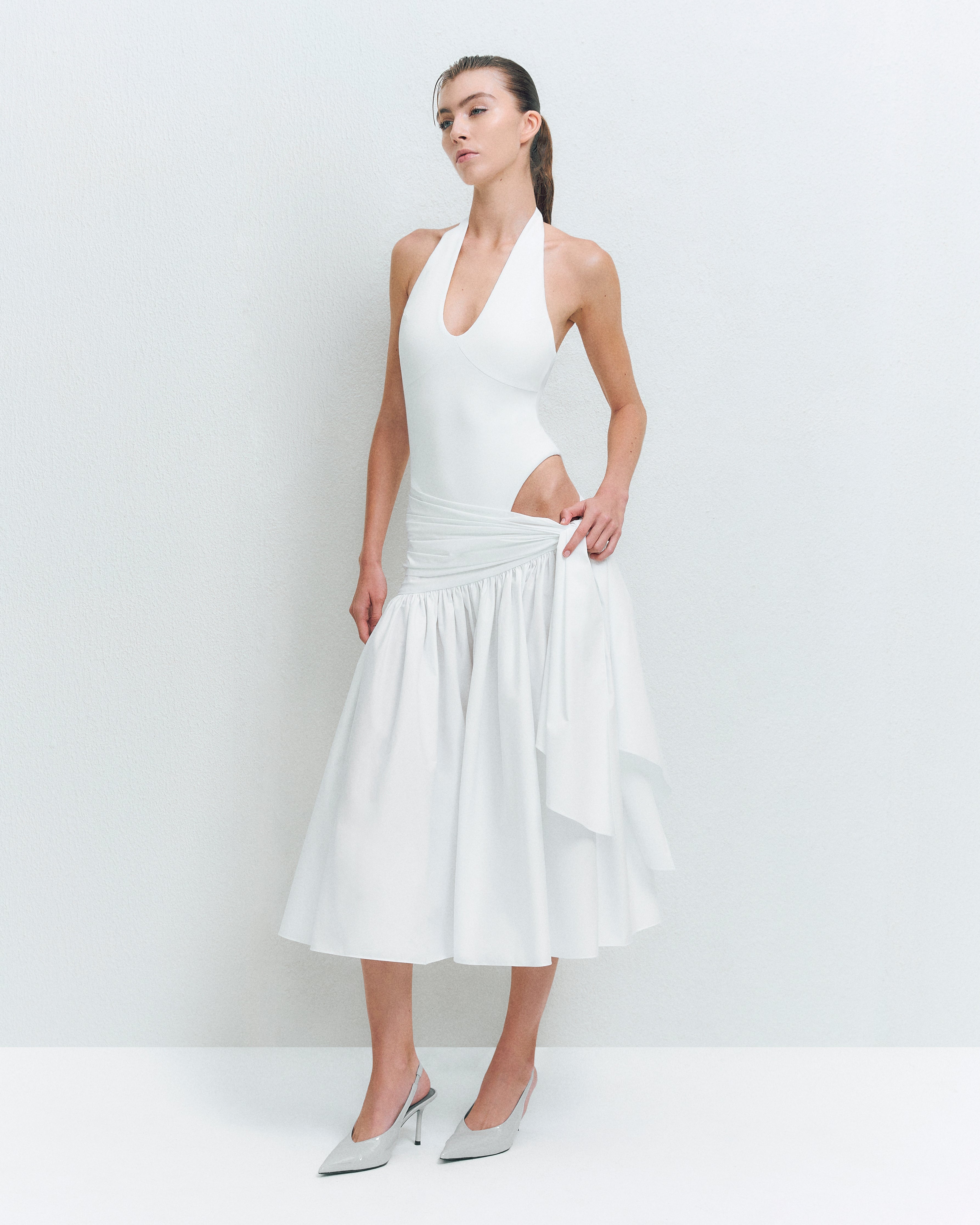 V-NECK PANELED BODYSUIT PAIRED WITH  KNOT DETAIL MIDI SKIRT