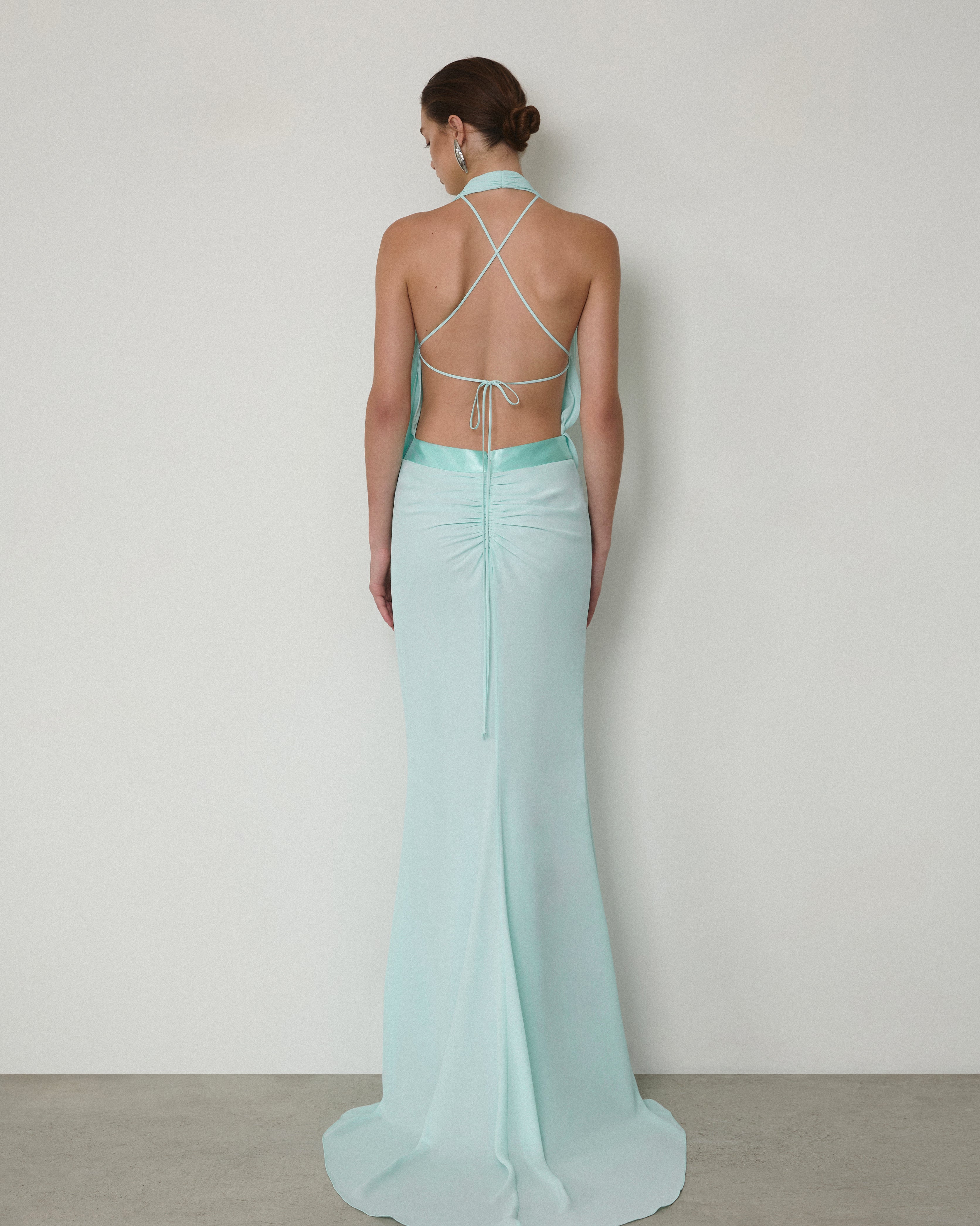 DRAPED SLEEVELESS V-NECK MAXI GOWN