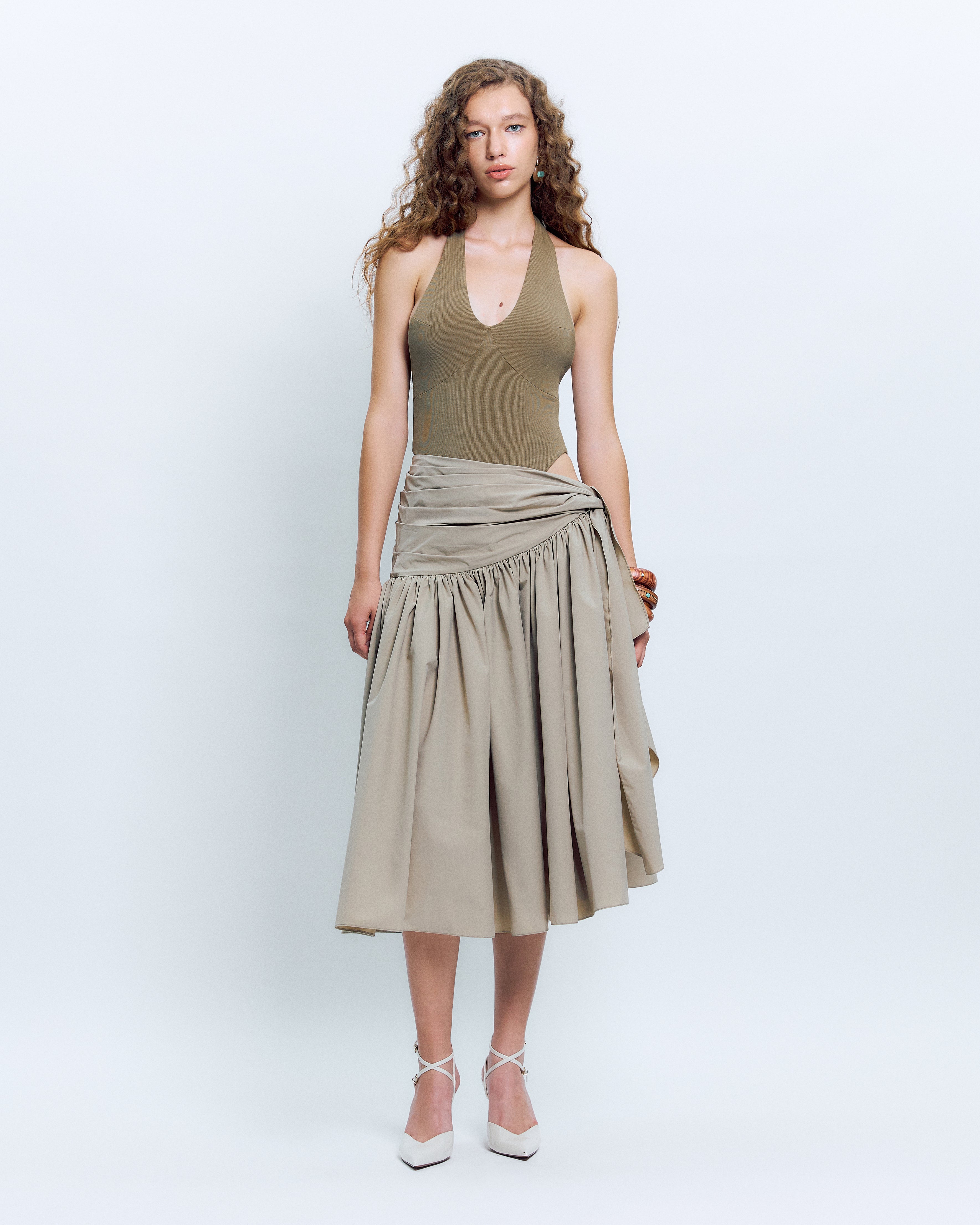 V-NECK PANELED BODYSUIT PAIRED WITH  KNOT DETAIL MIDI SKIRT